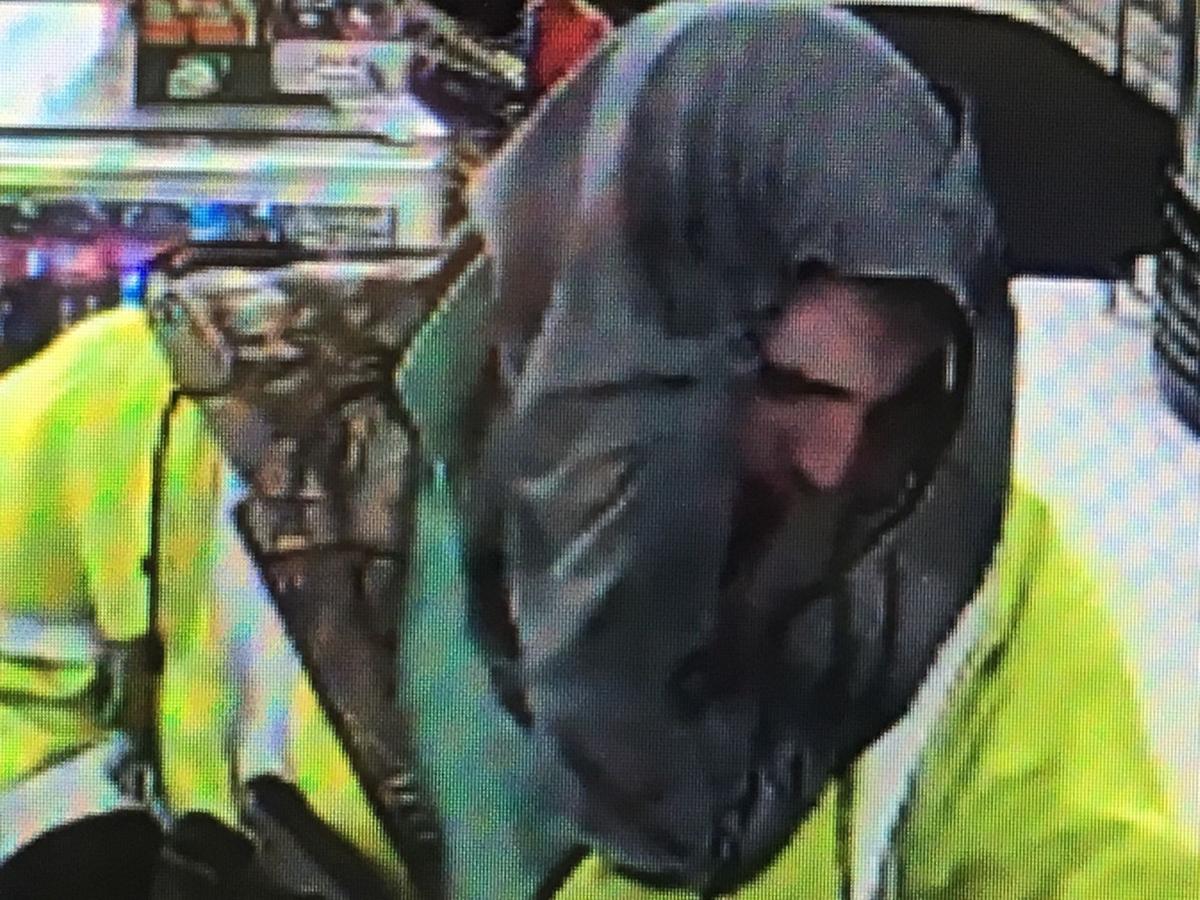 Clerk held at gunpoint in Granite Falls robbery; suspect sought Crime