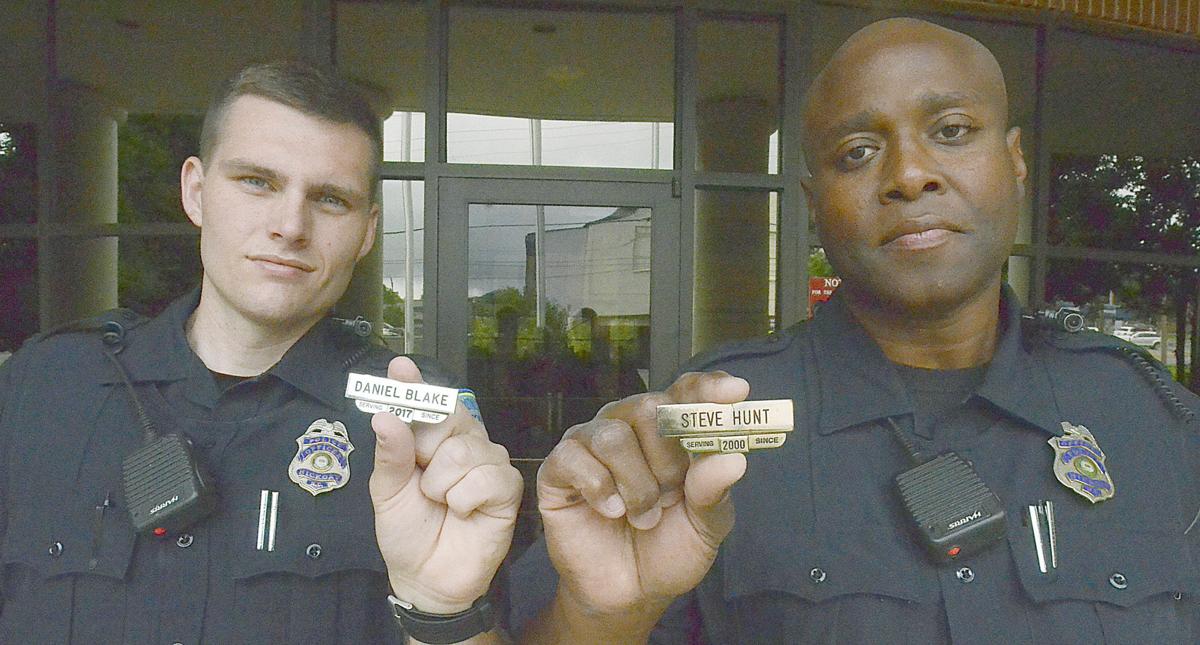 How will Hickory attract more police officers?
