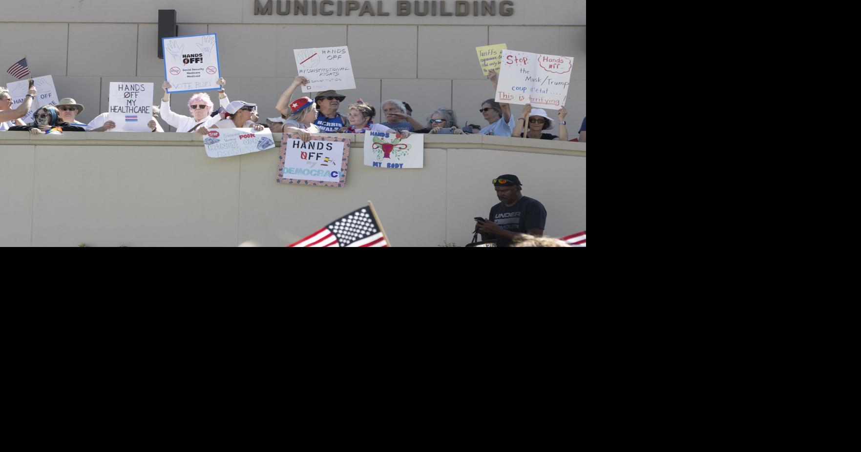 Hickory Hands Off rally draws more than 500 protesters to downtown