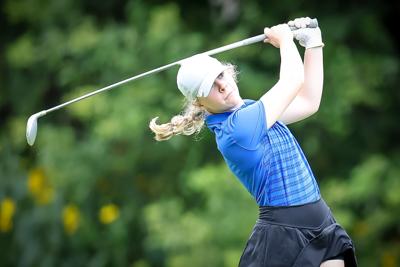 Crystal Magnuson tees off