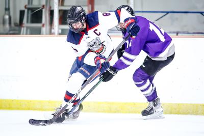 Tanner Lundwall skates against Bottineau-Rugby