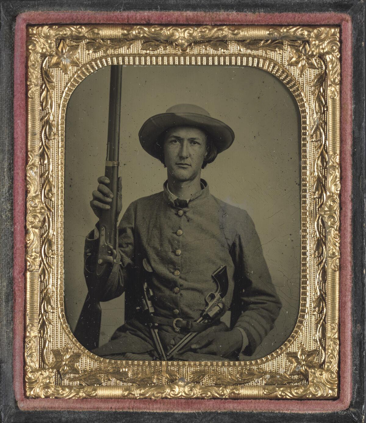 Confederate-infantry-uniform-with-model-1842-musket-and-two-Colt-revolvers.jpg