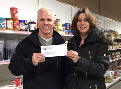 Hallman Lindsay Donates To Sun Prairie Emergency Food Pantry