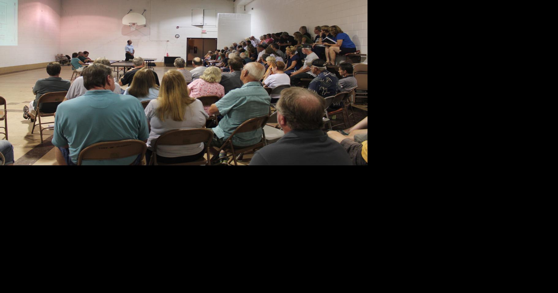 Residents vote down town hall Press