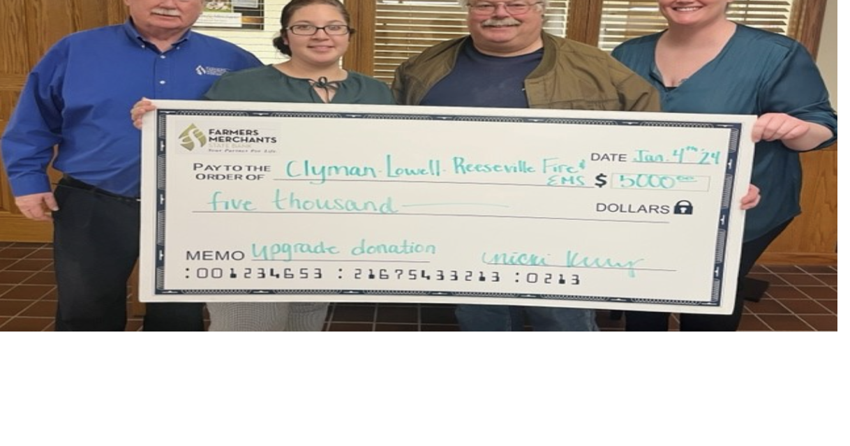 Farmers and Merchants State Bank donates 5,000 to Reeseville Fire