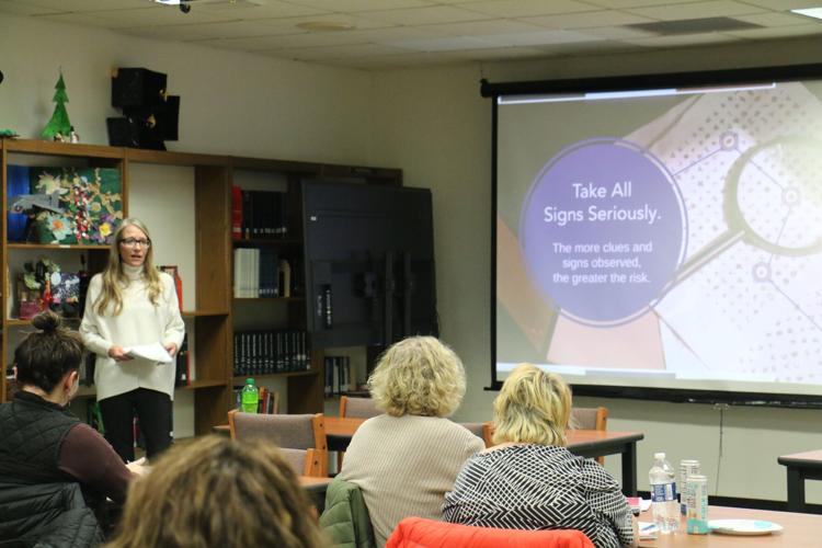 school staff get suicide prevention training Local