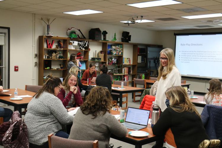 school staff get suicide prevention training Local