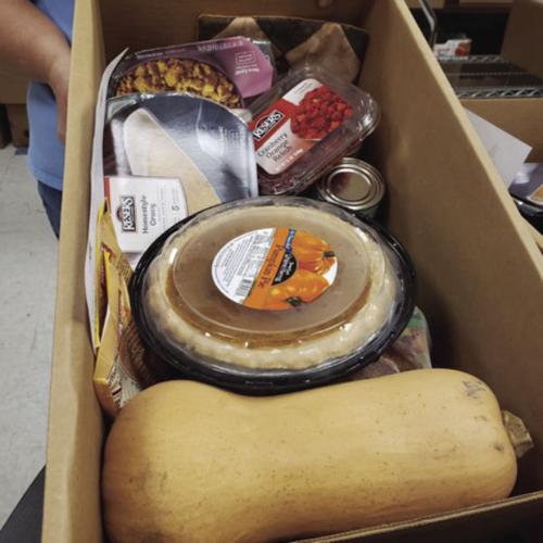 food pantry hands out Thanksgiving meal items to 50 families Local