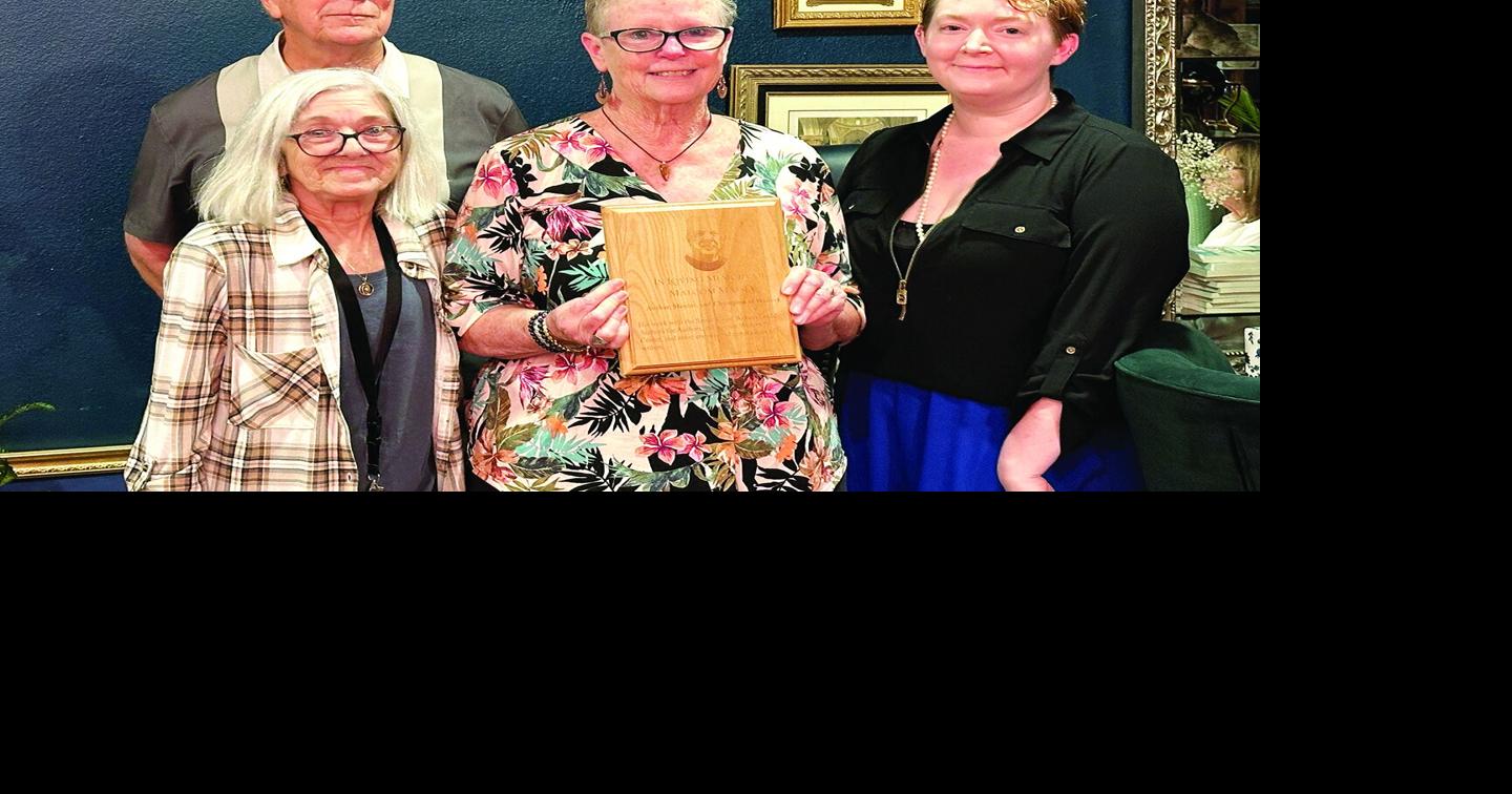Writers remember mentor with plaque at Moon River Café