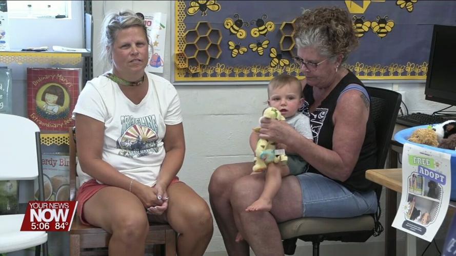 Volunteers from Deb's Dogs chat with kids at Cairo library about animal rescue and responsible ownership