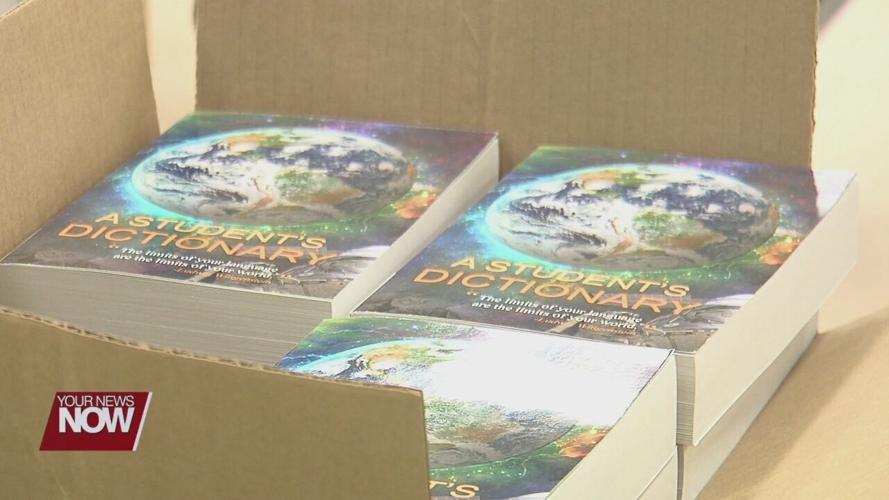 St. Marys Rotary Club hands out dictionaries to third grade students