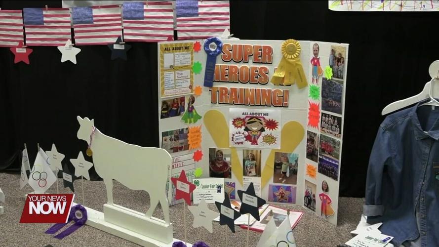 Junior fair exhibitors at the Auglaize County Fair showcase their skills and well-earned ribbons