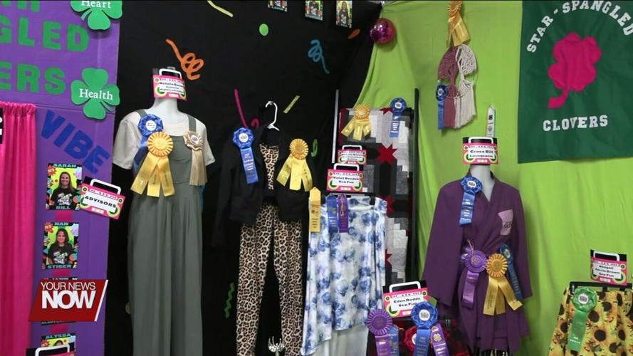 Junior fair exhibitors at the Auglaize County Fair showcase their skills and well-earned ribbons