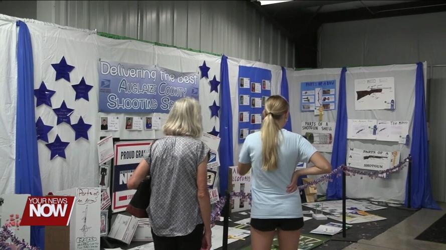 Junior fair exhibitors at the Auglaize County Fair showcase their skills and well-earned ribbons