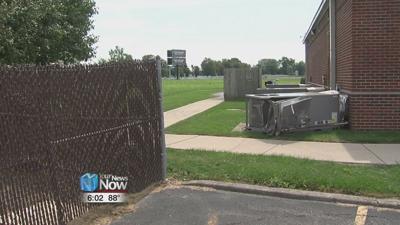 Box truck accidentally strikes ac unit and snaps off gas line at Lima business 1.jpg