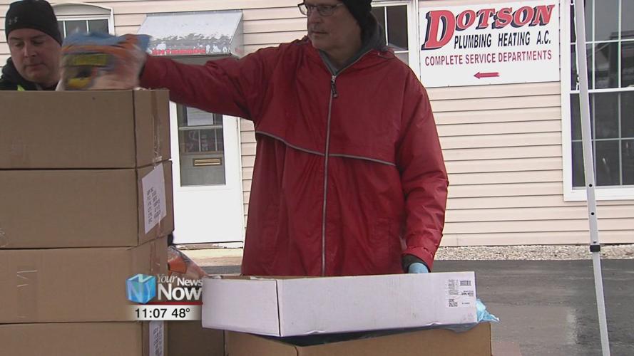 Area volunteers donating food to those in need