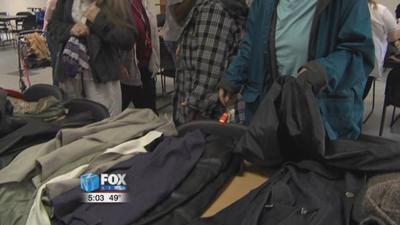 Local church distributes coats, gloves, and scarves