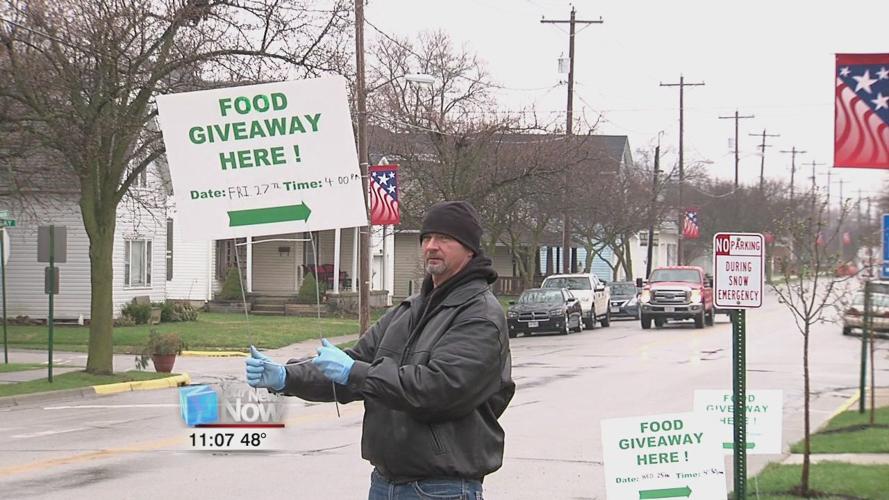 Area volunteers donating food to those in need