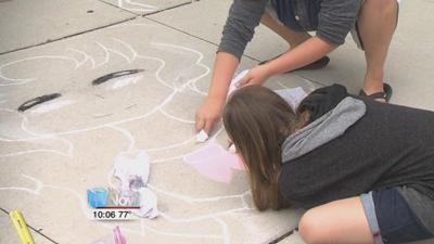 Chalk Walk and Sidewalk Sales decorate downtown