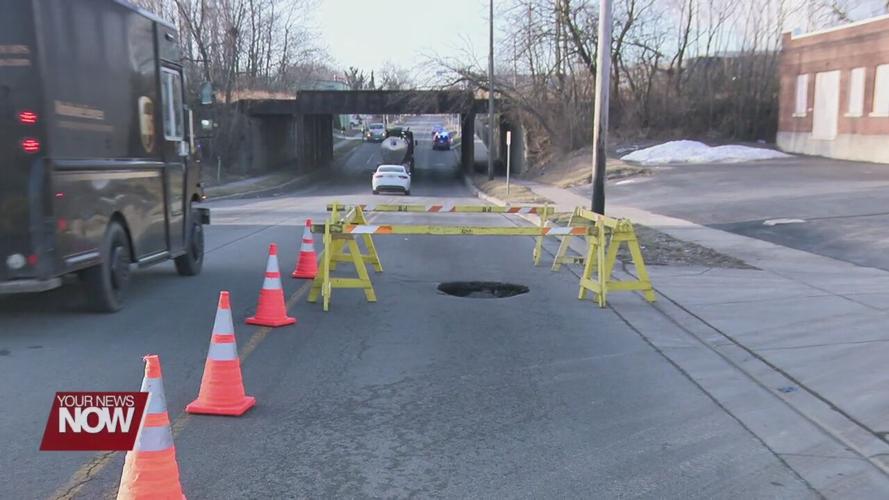 Sinkhole damages South Metcalf Street