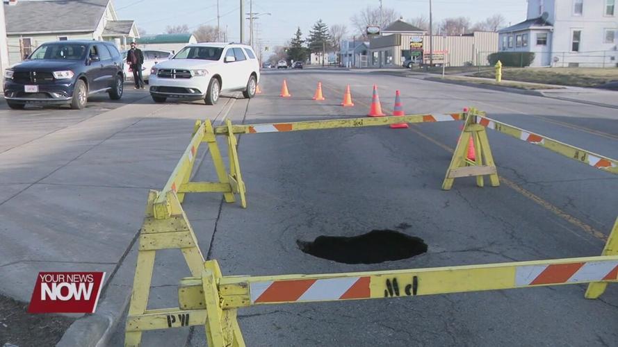 Sinkhole damages South Metcalf Street