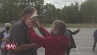 St. Anthony's staff get a pie in the face thanks to the hard work of their students