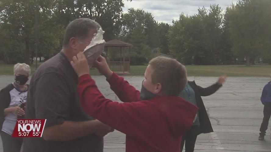 St. Anthony's staff get a pie in the face thanks to the hard work of their students