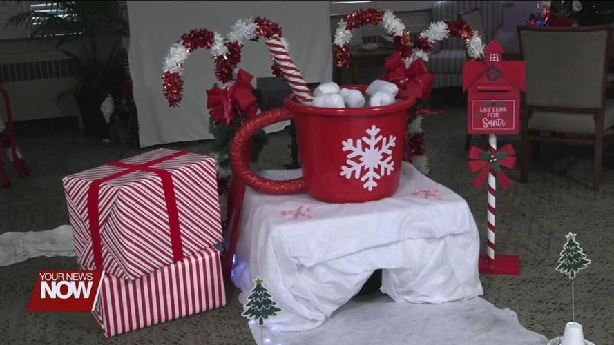 Lima Convalescent Home residents show off their putt-putt golf skills