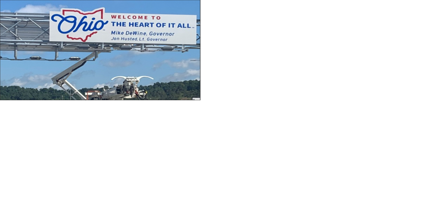 New signs welcoming travelers to the “Heart of it All”