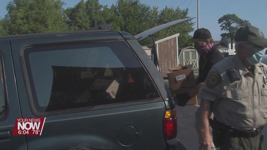 Drive thru bike helmet and food distribution in Lima