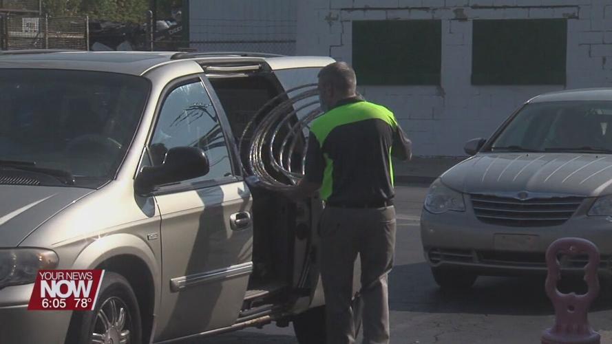 Drive thru bike helmet and food distribution in Lima
