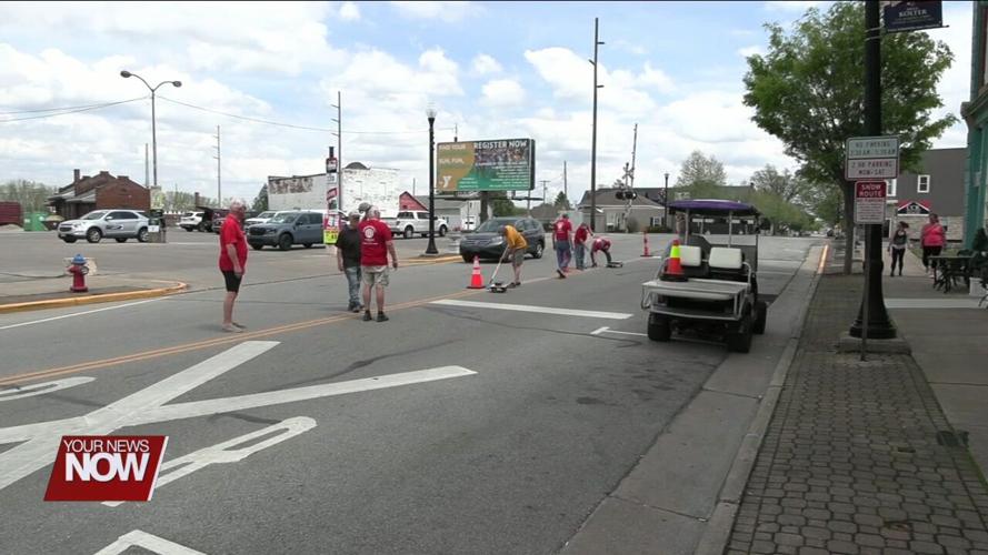 Wapakoneta Breakfast Club repaints a thin blue line on Auglaize Street