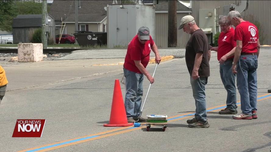 Wapakoneta Breakfast Club repaints a thin blue line on Auglaize Street