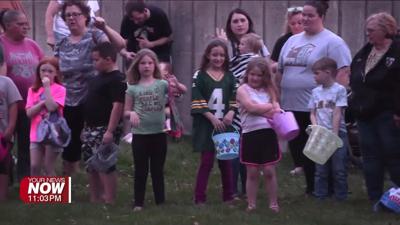 Fountain Park fills with families for glow-in-the-dark Easter egg hunt
