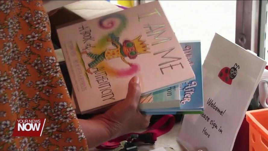 Lima City Schools' Spartan Ride receives book donation from OSU Lima Education Club