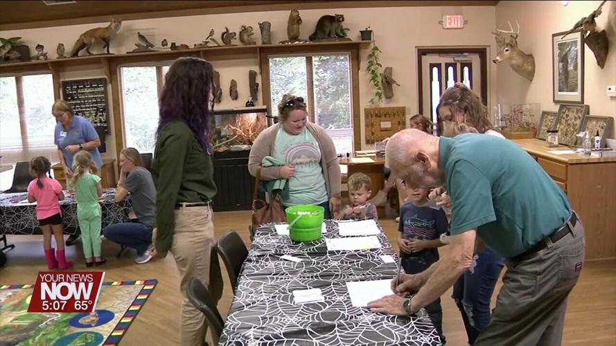Johnny Appleseed Metro Parks District's Nature Pals program learn about spiders