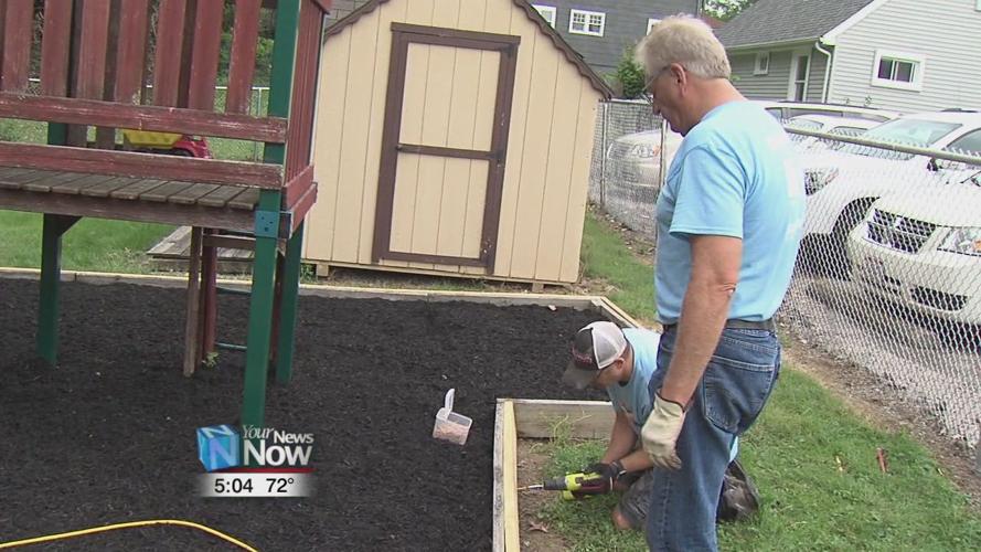 Over 300 volunteers roll up their sleeves for United Way Day of Caring in Lima 4.jpg