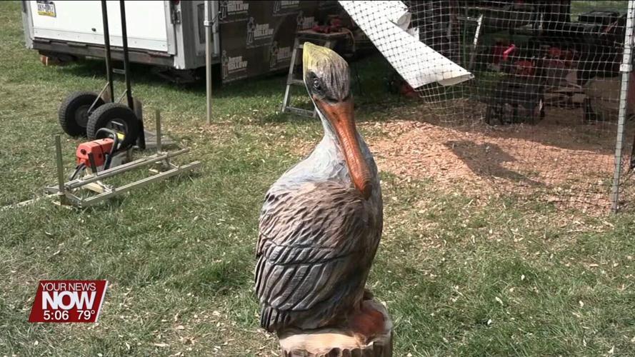 Bear Hollow Wood Carvers use chainsaws to sculpt beautiful art out of wood logs