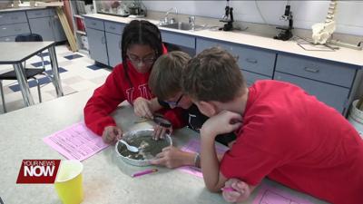 Lima students learning the difference in the soils found in the earth and their importance