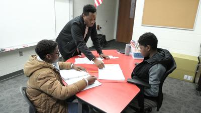 Communities rally behind Haitian tutor facing deportation threat