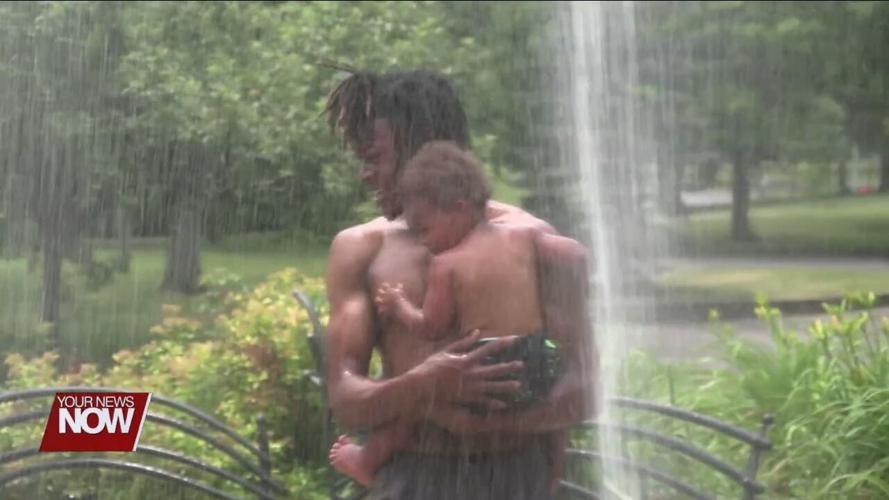 Families visit Faurot Park to cool off at the Children's Fountain