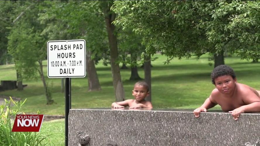 Families visit Faurot Park to cool off at the Children's Fountain