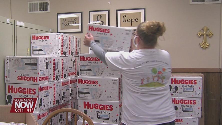 Family Promise is given donation of diapers from Chief Supermarkets