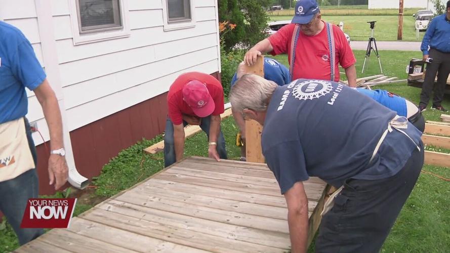 Local labor union installs access ramp to home of a family in need