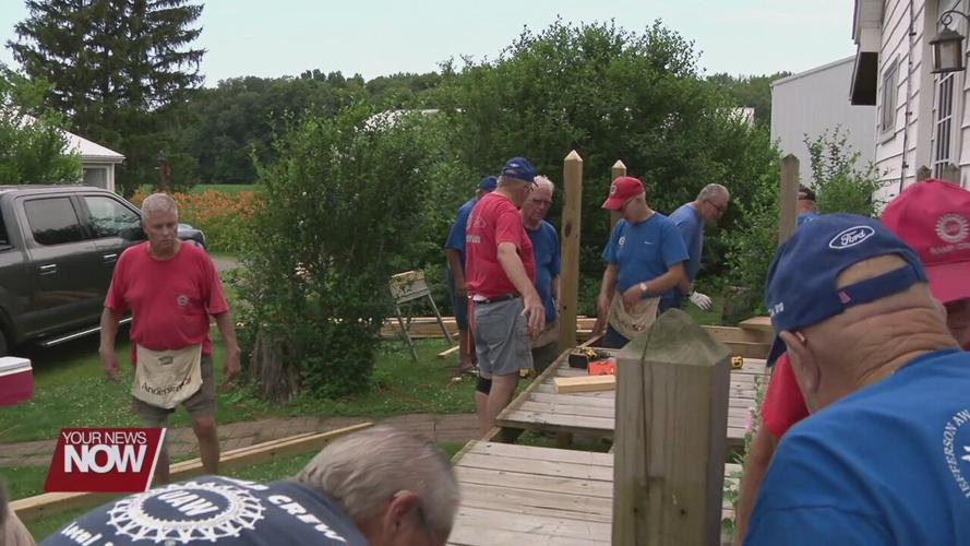 Local labor union installs access ramp to home of a family in need
