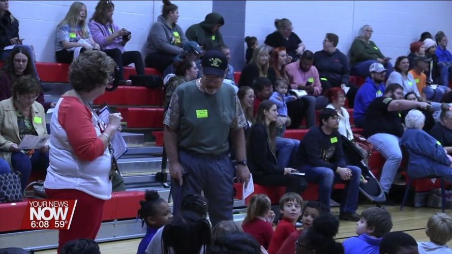 Heritage Elementary students learn about military service during Veterans Day celebration