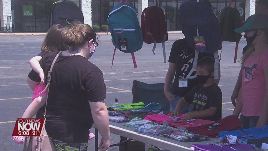 Wireless Zone donates backpacks to kids for the upcoming school year