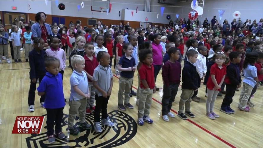 Heritage Elementary students learn about military service during Veterans Day celebration