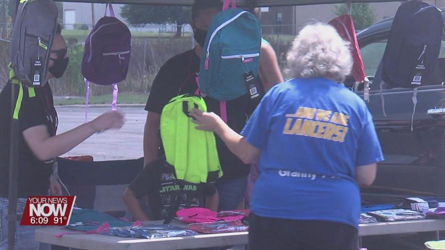 Wireless Zone donates backpacks to kids for the upcoming school year