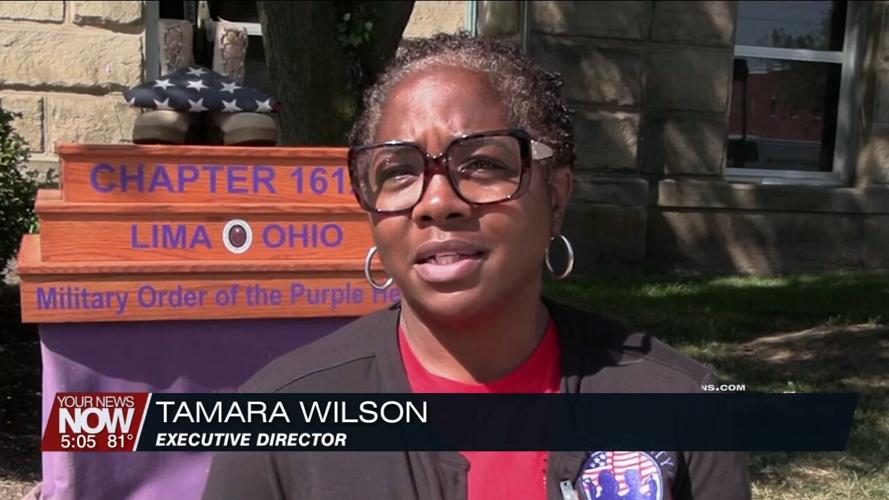 Veterans and volunteers stand watch to promote suicide awareness in front of the Allen County Courthouse